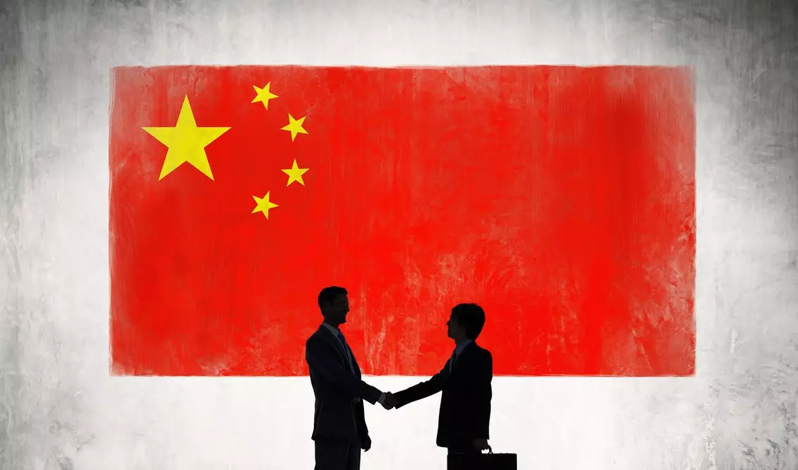 Business people shaking hand in China.