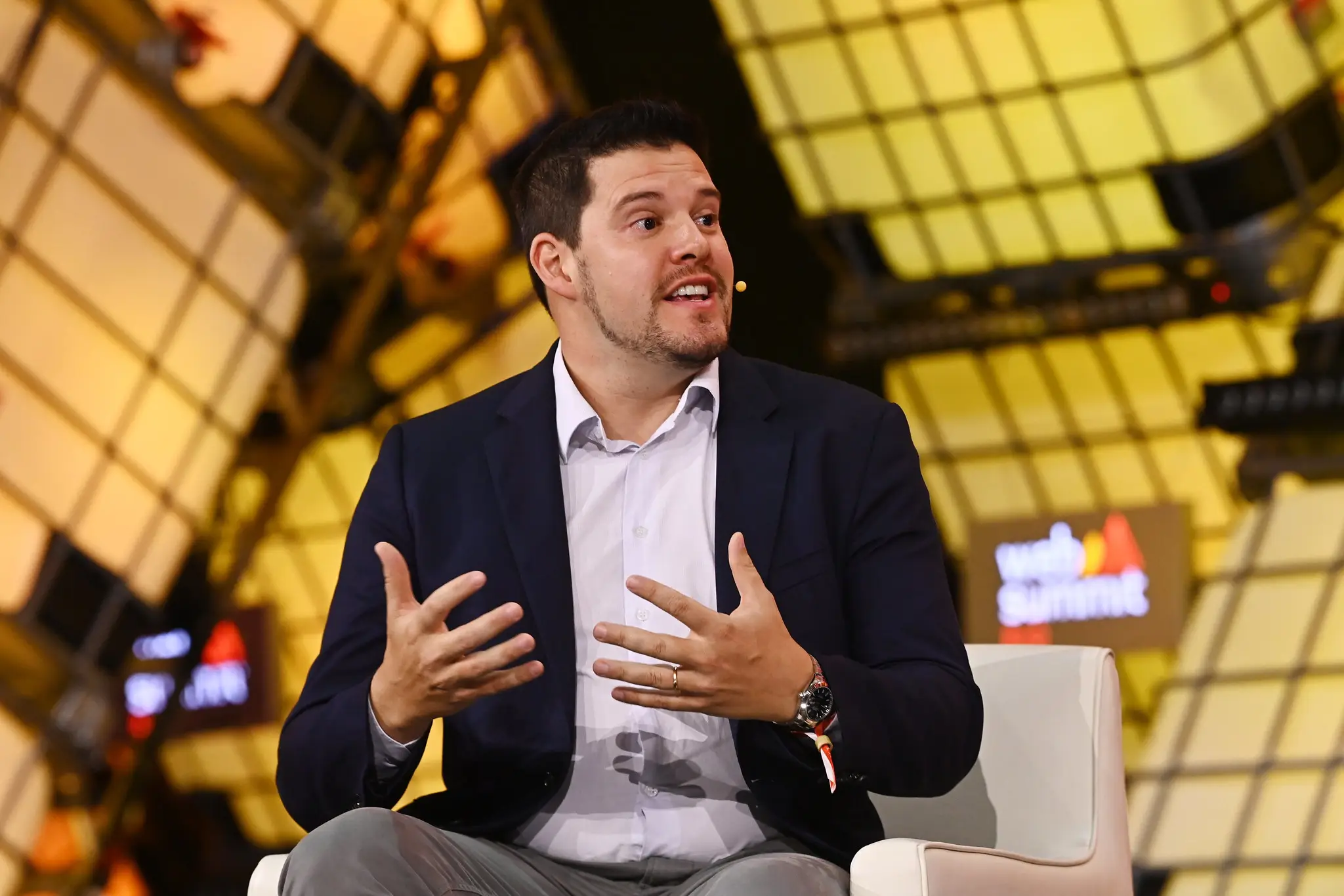 João Barbosa, cofundador da Wellhub, em painel durante o Web Summit Rio (Foto: divulgação)